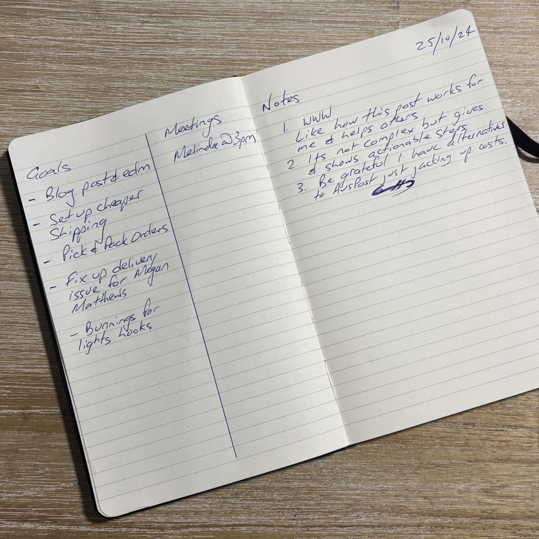 a notebook with writing on it